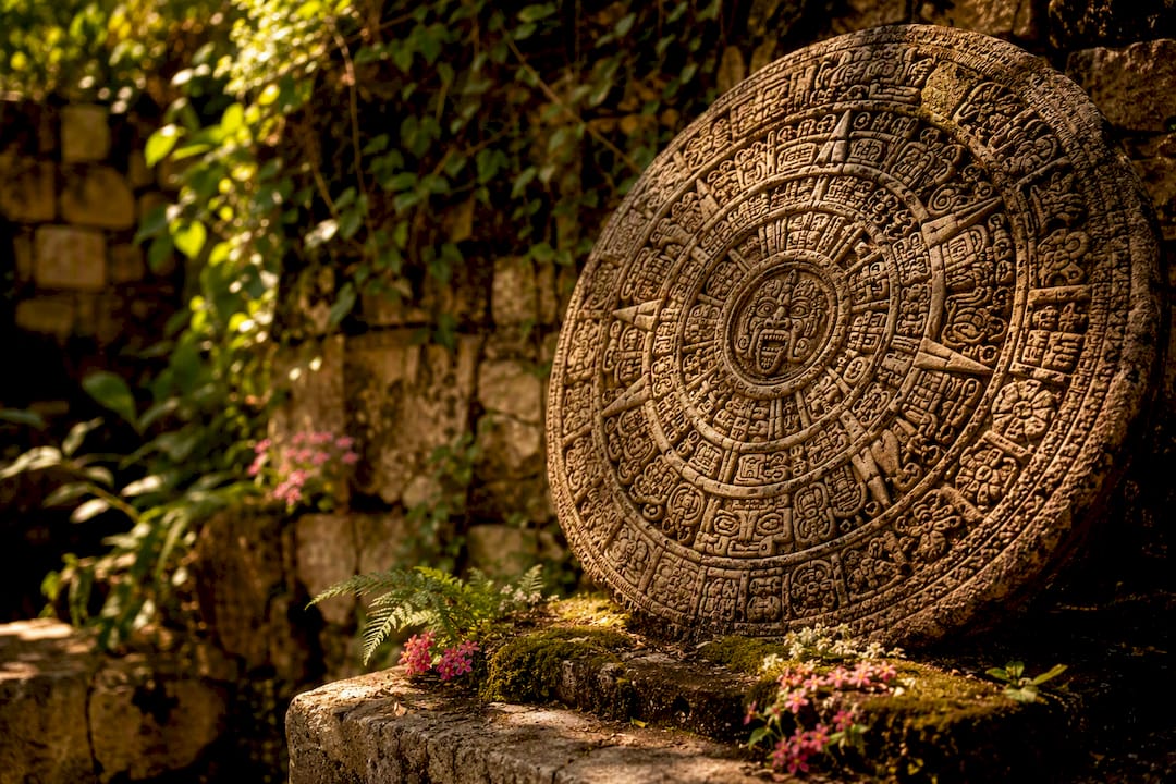 Stone Mayan calendar artifact outdoors